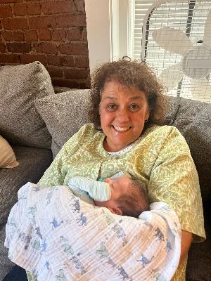Mom (Grammie) with Callan after he came home from the Brigham NICU